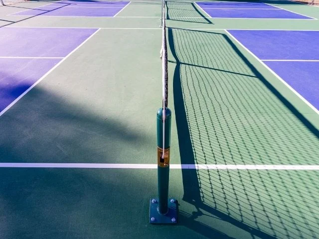 Match de pickleball en double